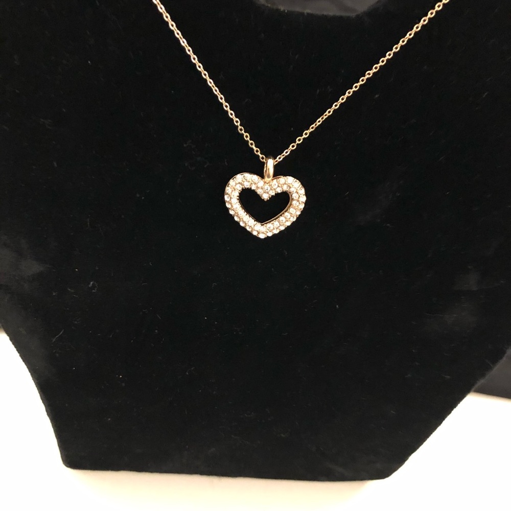 Not real gold necklace the stones are crystals